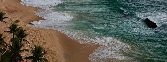sandy beach with waves - hypnosis for anxiety guide